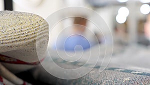 Fabric shop with visitors looking for textile for home in a supermarket