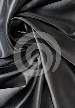 Fabric silk satin texture background black silber color.