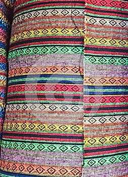 Fabric Store, Traditional fabric store with stacks of colorful textiles, fabric rolls at market stall - textile industry.