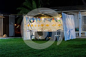 Sukkah - symbolic temporary hut for celebration of Jewish Holiday Sukkot photo