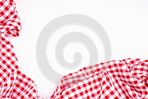 Fabric textile crumpled on white background with copy space. Tablecloth picnic Red, white texture checkers. on white background