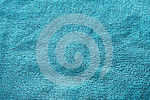 The fabric texture is made of blue microfiber. Close-up