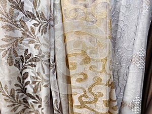 The fabric is tulle, chiffon, and transparent white curtains. Abstract background, texture, pattern. Space for text and