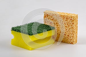 Fabricated dish sponge and natural honeycomb sponge isolated.