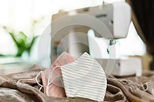 Fabrics and sewing machine for sewing an anti-virus face mask during the coronavirus pandemia