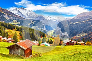 Fabulous autumn view of picturesque alpine Wengen village and Lauterbrunnen Valley