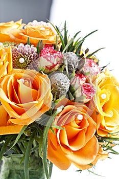 Fabulous bouquet of orange roses and other flowers