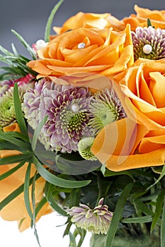 Fabulous bouquet of orange roses and other flowers