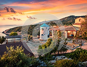 Fabulous morning scene of the contryside with Windmill. Colorful spring sunrise on the Zakynthos island, Korithi location, Ionian