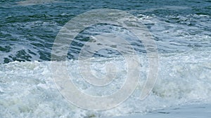 Fabulous Sea Tide On A Stormy Day. Big Waves And Tide On Beach. Dark Sea Nature Background. Slow motion.