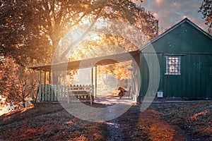 Fabulous small house in the autumn landscape