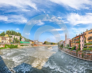 Fabulous Verona cityscape view on the riverside with historical buildings and towers