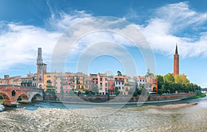 Fabulous Verona cityscape view on the riverside with historical buildings and towers