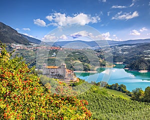 Fabulous View of the Cles Castel, the Santa Giustina Lake and lots of apple plantations