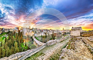 Fabulous view on Gravina in Puglia ancient town, bridge and canyon at sunris