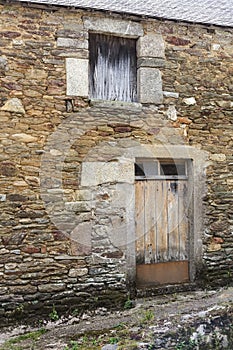 Facade of abandoned ruins of an old rural fisherman house in Do