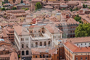 Facade in aerial view of Cassa di Risparmio palace with basilica in background, Bologna ITALY