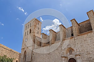 Facade of Almudaina Castle in Eivissa shows medieval architecture under a clear sky