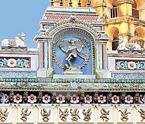 Facade of an ancient royal palace Nayak in Thanjavur with a sculpture of a dancing Shiva