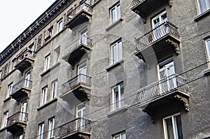 Facade with balconies of old apartment building in Lvov