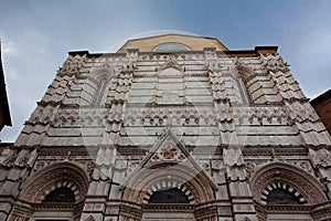 Facade Baptistry of St. John, Battistero di San Giovanni, Siena, Italy photo