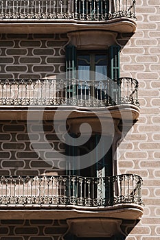 A facade of Barcelona building, pastel colors