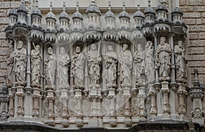 Facade of Basilica of Santa Maria de Montserrat, Benedictine Montserrat Abbey, Barcelona, Spain.