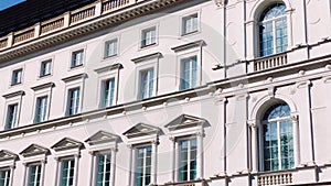 Facade of a beautiful classical style building in european Old Town, architecture and real estate