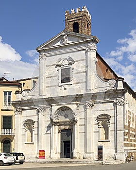 Facade and bell tower of the Church of Saints John and Reparata in Lucca, Italy.