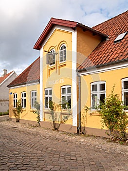 Facade of bibliotek, library in old town of Mariager, Nordjylland, Denmark