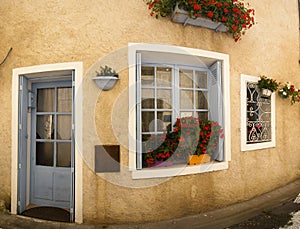 Facade with blue door window Brantome France