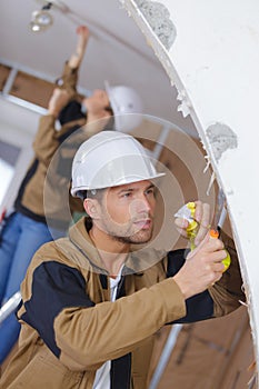 Facade builder plasterer at work