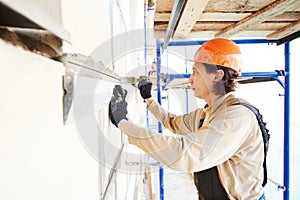 Facade builder plasterer at work