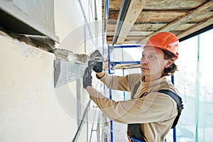 Facade builder plasterer at work