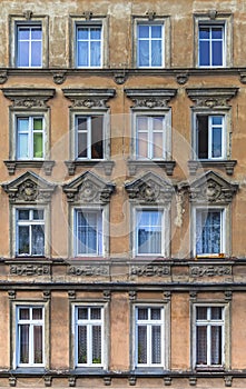 The facade of the building with a large number of windows