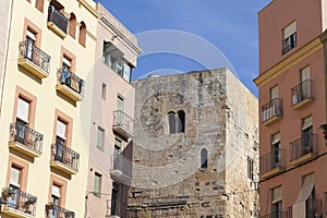 Facade building,roman tower provincial forum of Tarraco between photo
