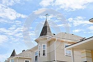 The facade of the building with weathervane