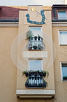 Facade of building with windows, balconies and decoration in Berlin