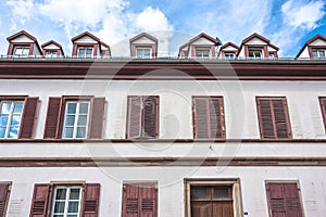 Facade of a building with windows in Petite France in Strasbourg