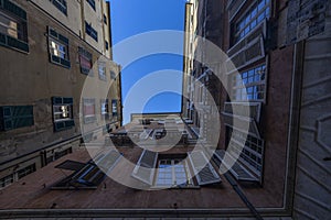 Facade of buildings of the historic center of Genoa, Italy