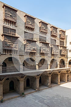 Facade of caravansary of Bazaraa, with vaulted arcades suited in Gamalia district, Medieval Cairo, Egypt photo