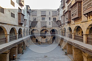Caravansary Wikala of Bazaraa, with vaulted arcades and windows covered by interleaved wooden grids mashrabiyya, Cairo, Egypt photo