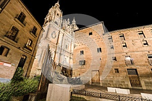 Facade of Casa de las Conchas in Salamanca at night, Spain, cove