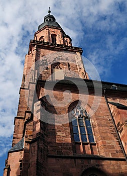 The Facade Of The Cathedral`s Bell Tower In Heidelberg Germany On A Beautiful Sunny Summer Day