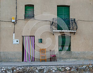 Facade of centennial house in Castilian town in Spain