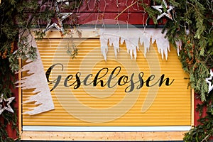 Facade of a christmas market stall, german word, closed