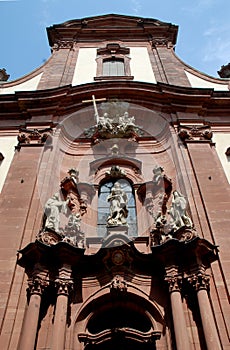 Facade of a church and a bit of blue sky in Mainz in Germany