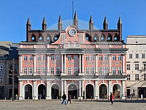 facade of the city hall of rostock, germany at a sunny day with blue sky
