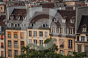 Facade close-up of typical semidetached buildings seen from the Center Georges Pompidou in Paris.