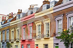 Facade of colourful terrace houses in Camden Town, London